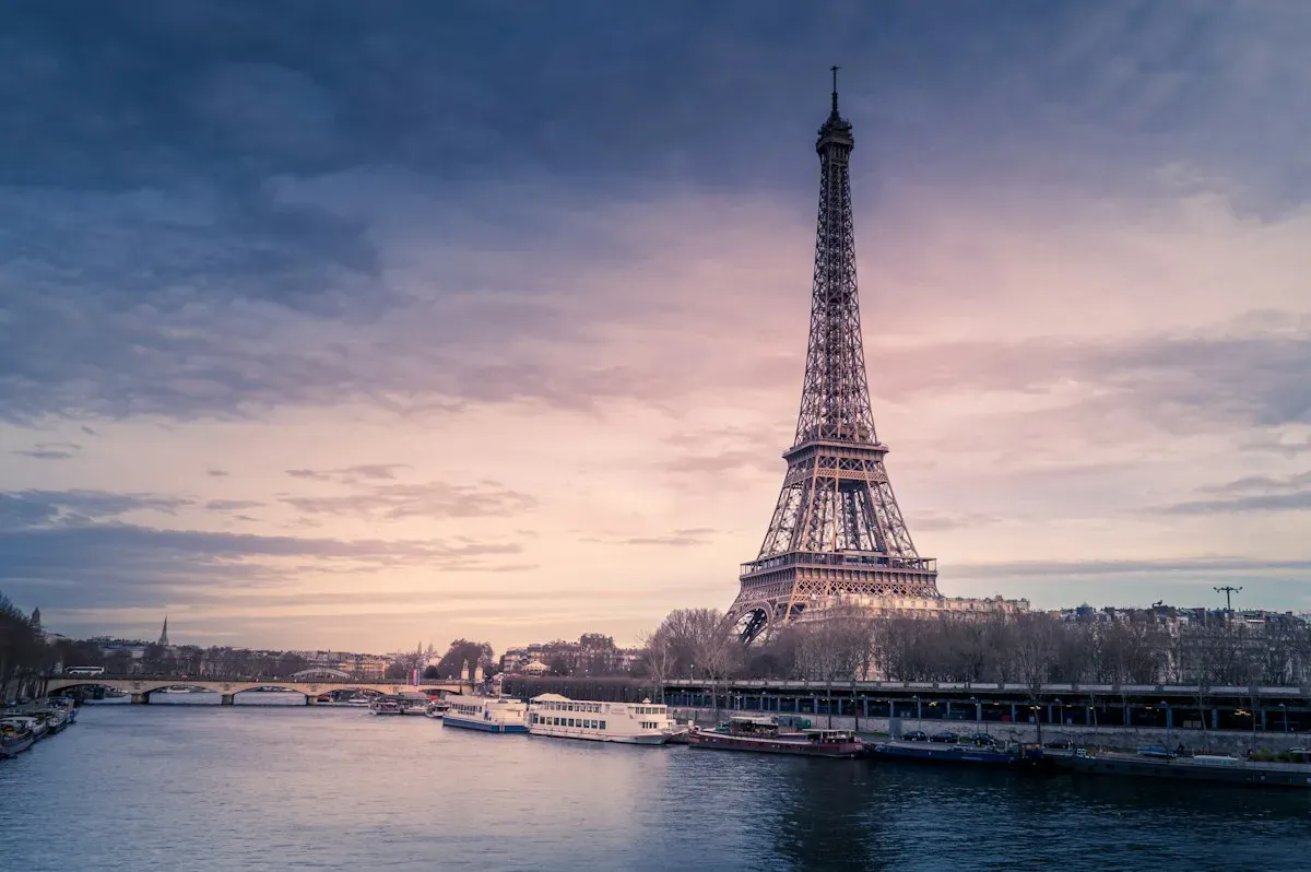 Eiffel Tower rising above Paris at twilight
